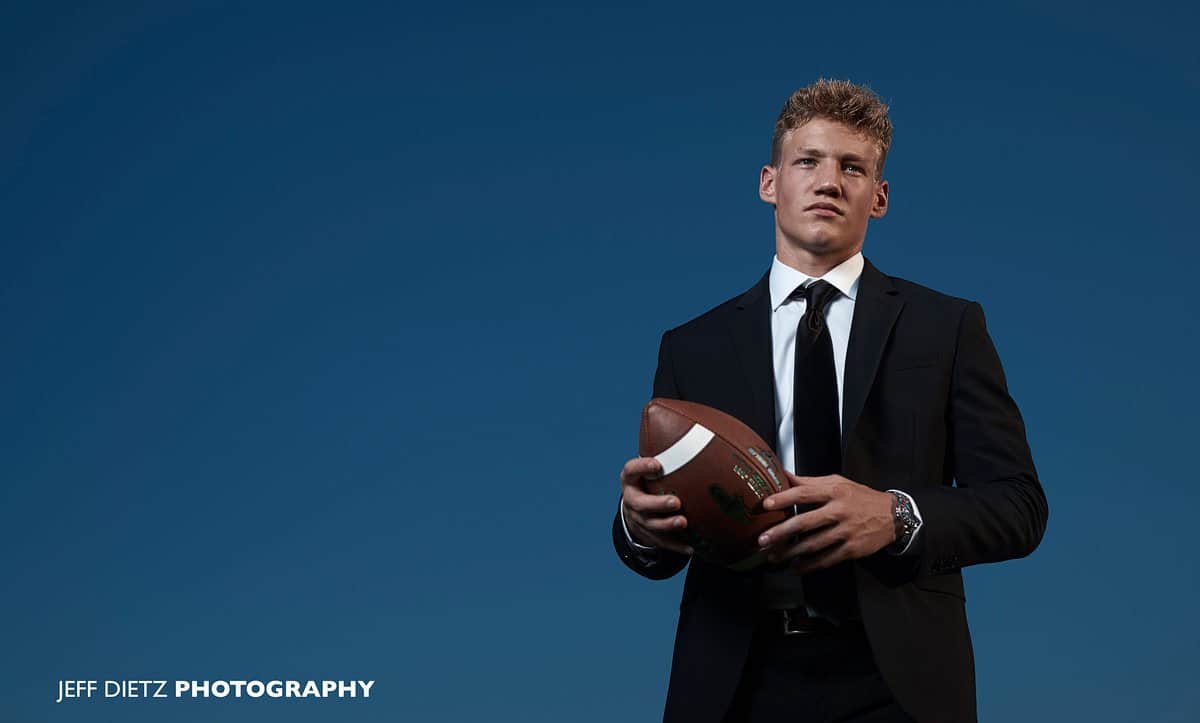 2019 boys prosper senior portraits of football player in black suit