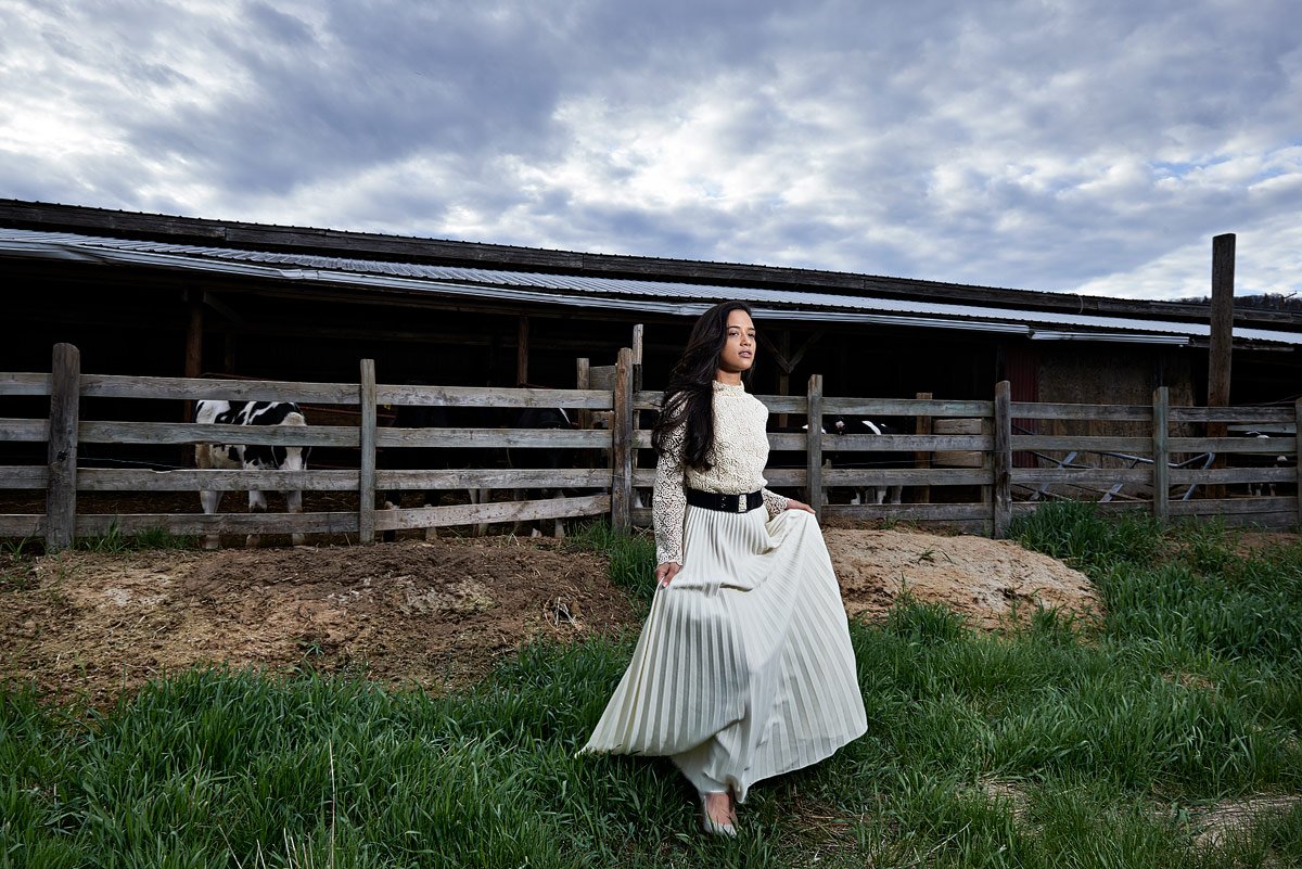 Farm senior portraits in mckinney of girl in white long dress