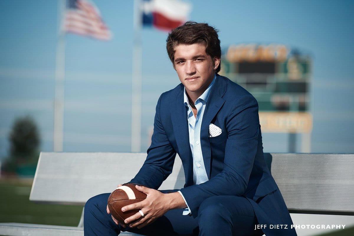 Legacy Christian Senior Football player poses for portraits at comstock field in frisco