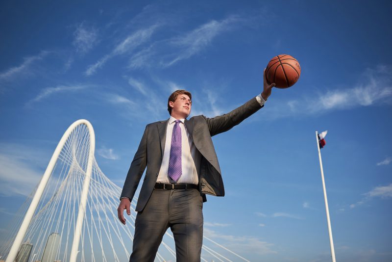 Richardson Senior Portraits of basketball player on the kirk bridge in Dallas Texas