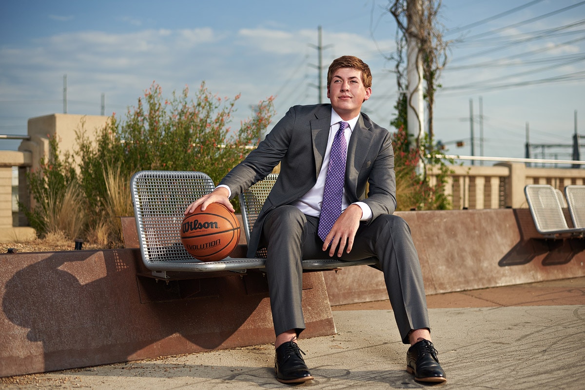Richardson Senior Portraits of basketball player on the kirk bridge in Dallas Texas